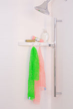 Load image into Gallery viewer, WOWO Body Scrubber in Clean Green and Coral Clean hanging in a shower with Coral Clean Face WOWO on soap shelf
