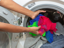 Load image into Gallery viewer, three WOWOs being thrown into the washing machine
