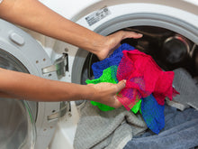 Load image into Gallery viewer, three WOWOs being thrown into the washing machine